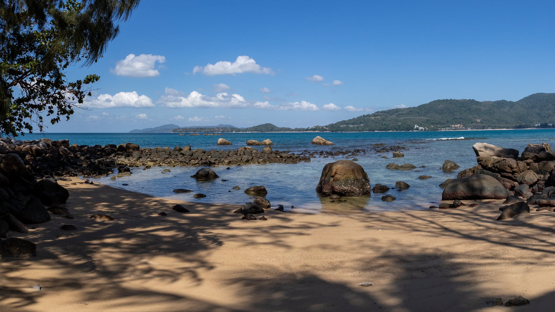 Hua Beach Phuket small bay with fishing boats near the shore