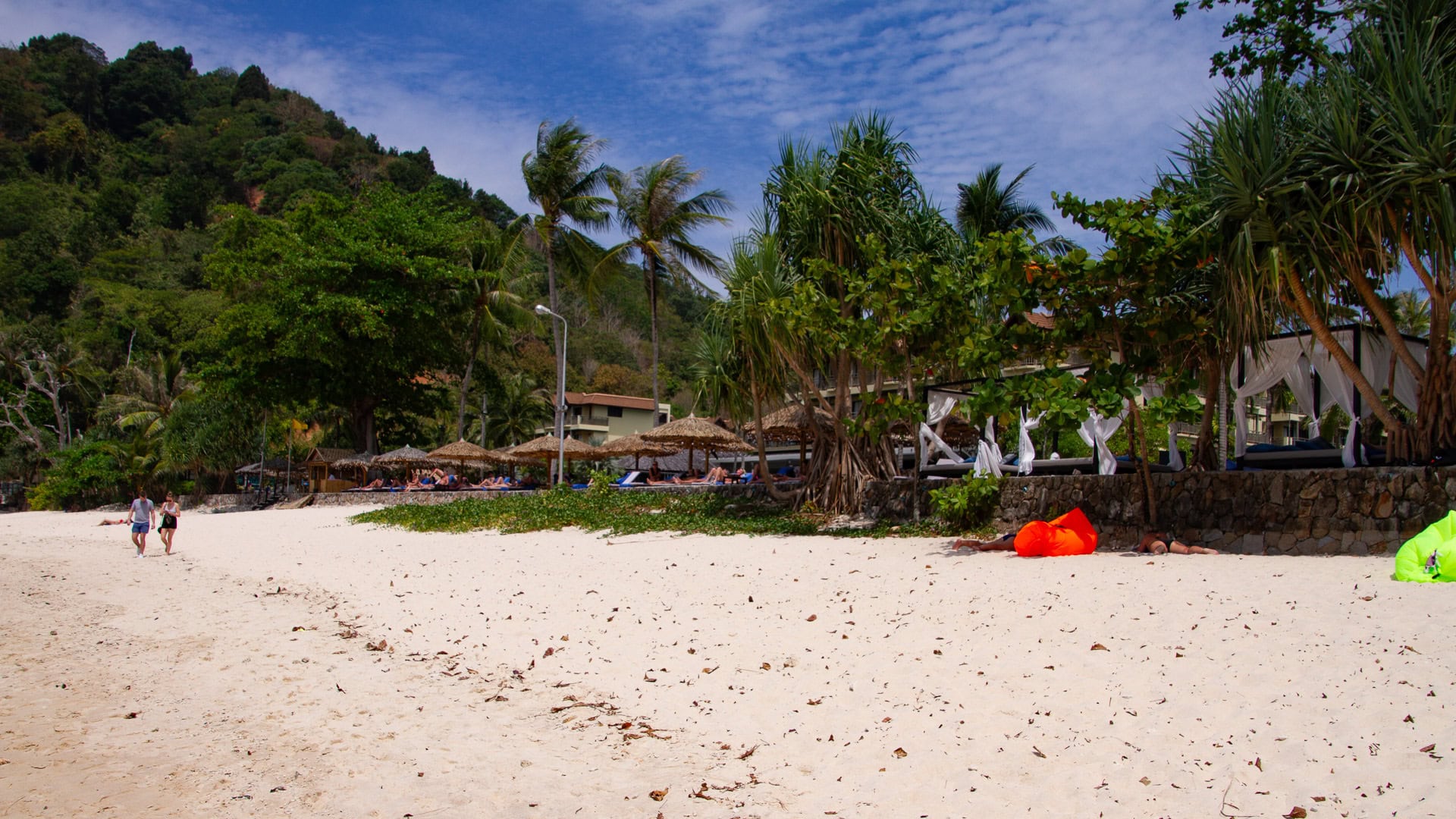 Merlin Beach Phuket beach curve with light sand and rocky seabed